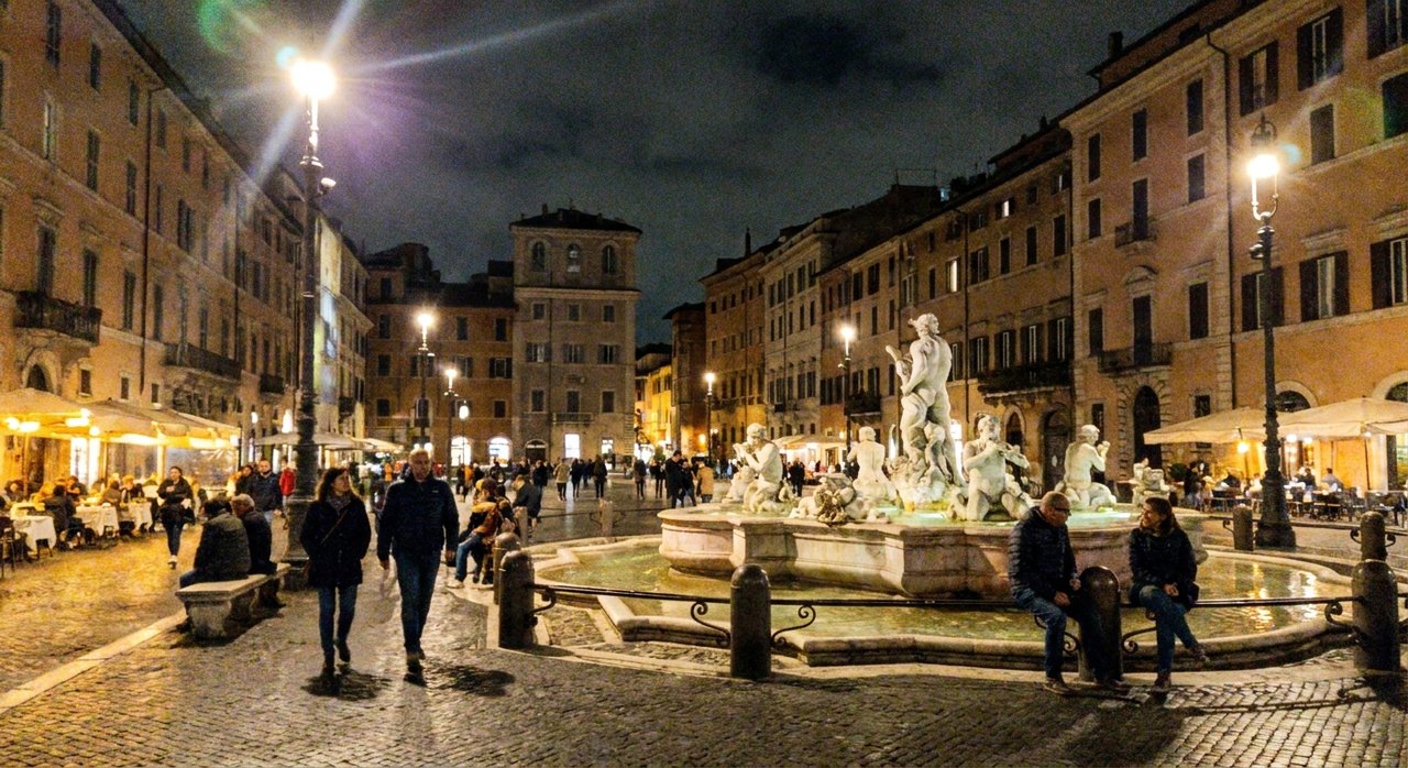 A piazza in central Rome at dusk